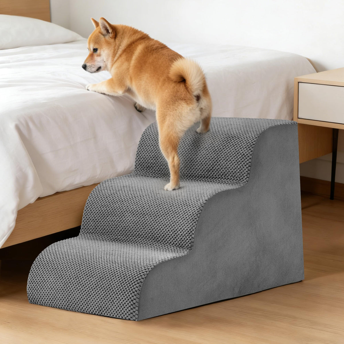 Shiba climbing Pawmere 3-step pet stairs onto the bed